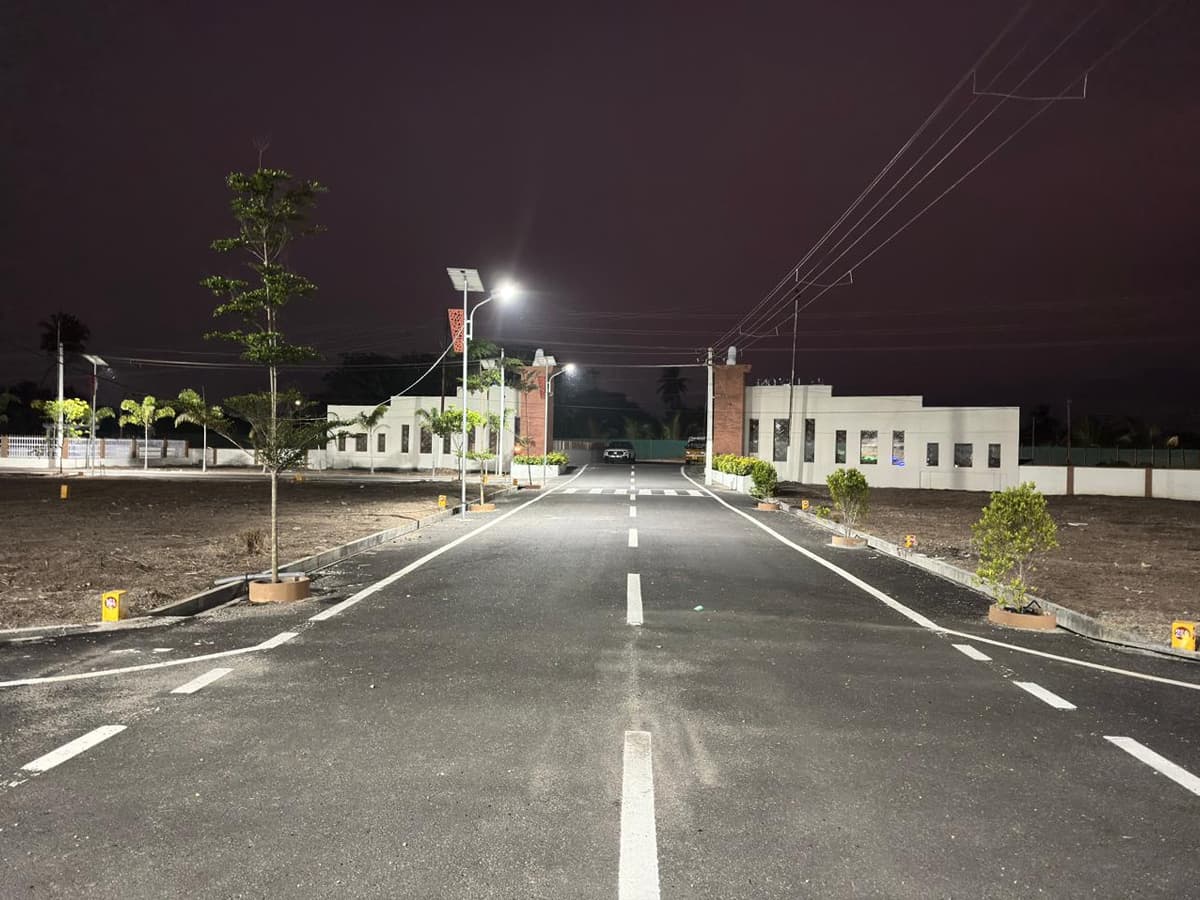 Riverside By Tamil Nadu Villas — entrance road at night