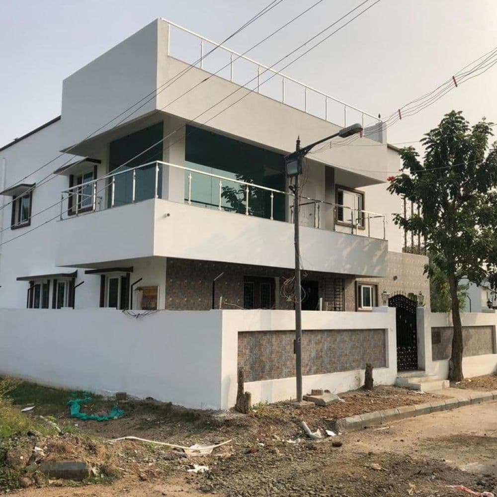 House nearing completion, finishing-stage exterior