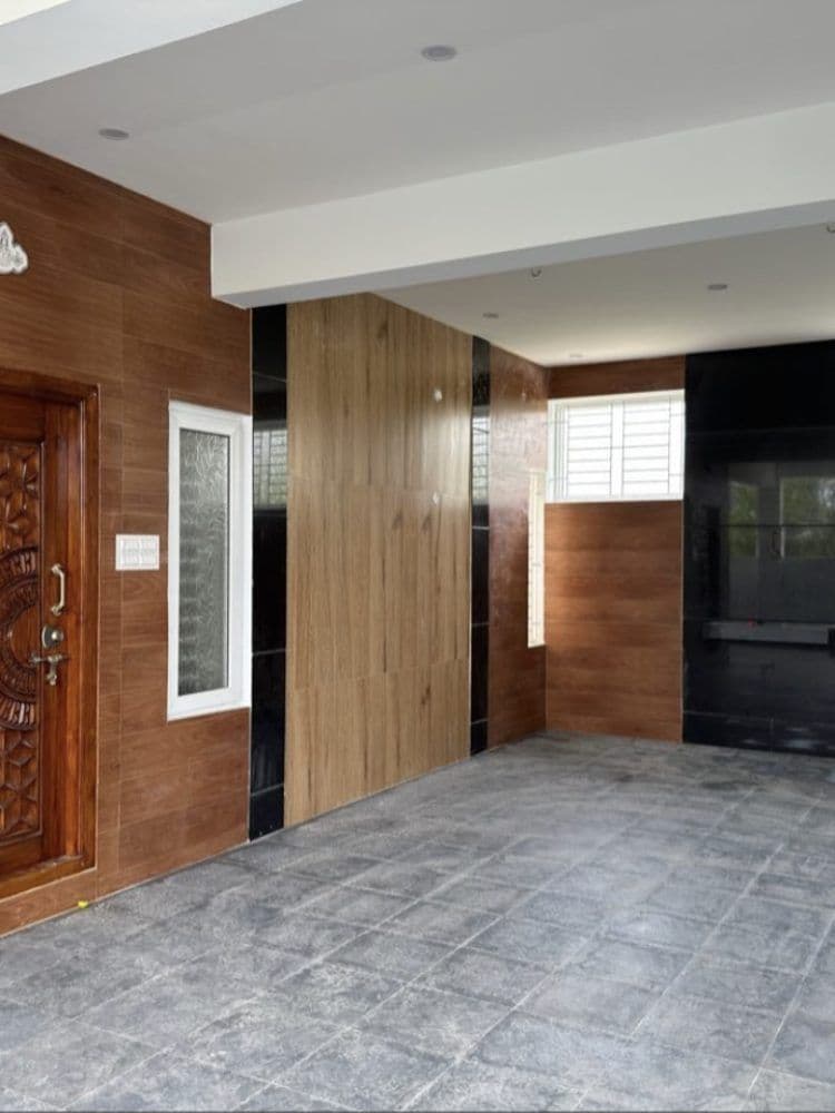 Entrance foyer, wall cladding and main door